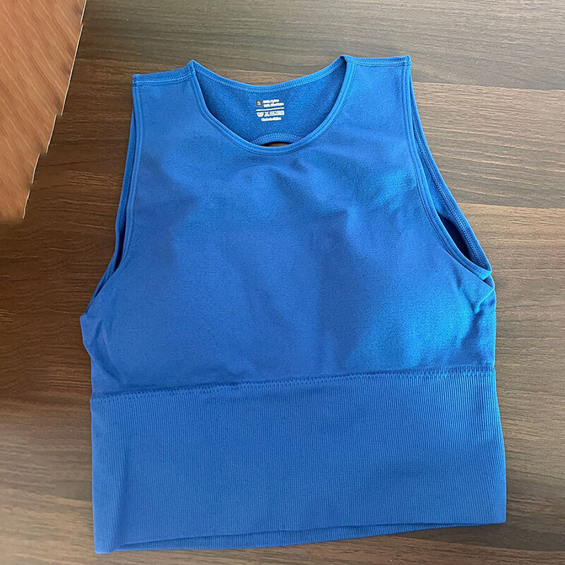 Blue backless women's tank top for pilates, featuring anti-pilling and quick-drying spandex and nylon fabric.